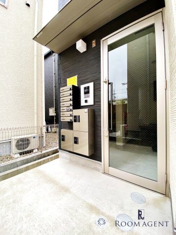 Lega庄内通(名塚二丁目A)北側の建物のエントランス