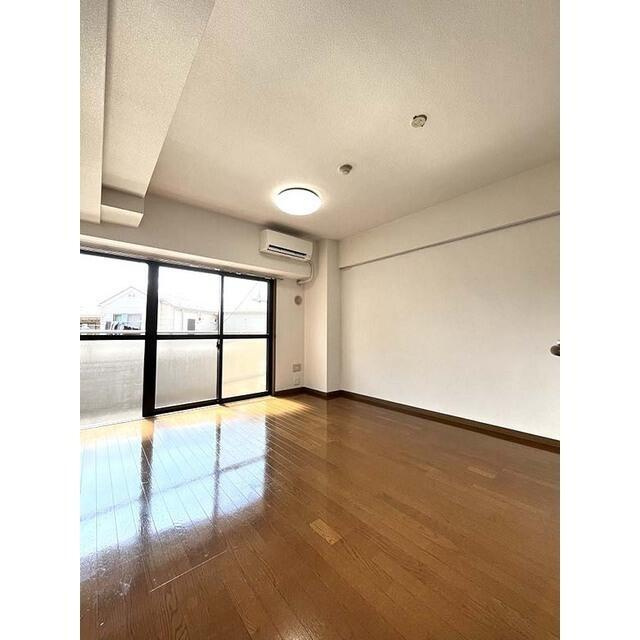 川崎市多摩区登戸の賃貸マンションの居間・リビング