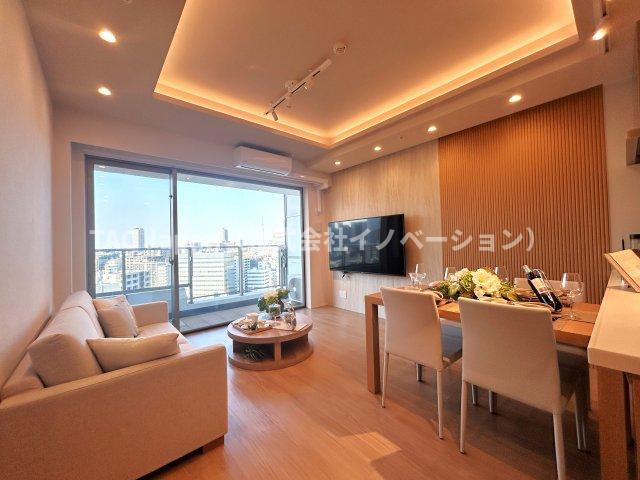 パークシティ中央湊ザタワーの居間・リビング|～Dining Kitchen～動線が上手く考えられており、きっちりとキッチン、ダイニング、リビングと分けられるお部屋のつくりとなっております。