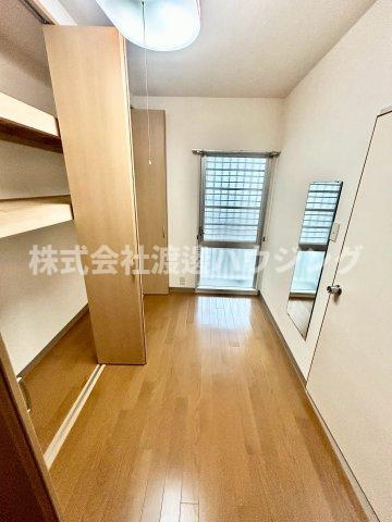 プレステージ新千里西町2号棟の洋室