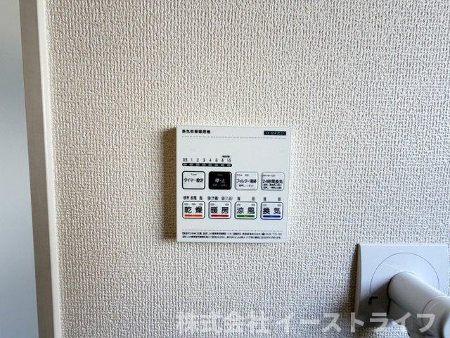 【新築戸建】　いわき市泉町滝尻第2　全8棟の冷暖房・空調設備|同社施工写真　浴室乾燥機リモコンです。