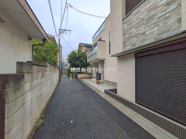 板橋区大山金井町　LDK22帖超　車庫付×省エネ住宅の外観パース