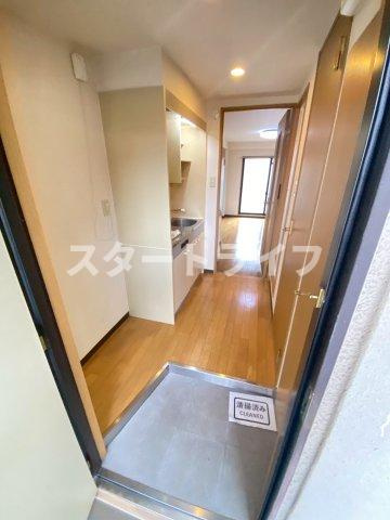 大阪市東淀川区西淡路２丁目の賃貸マンションの玄関