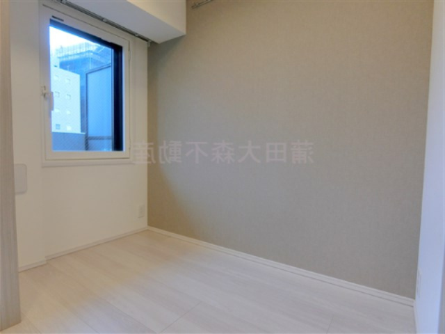 アークマーク大森町アジールコートの洋室