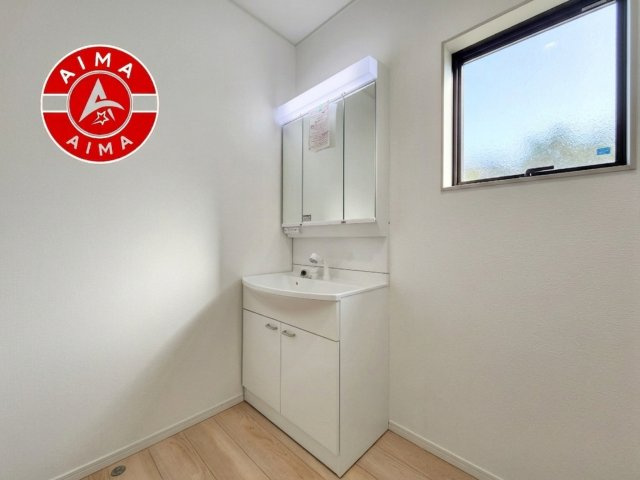 福岡市東区八田1丁目第11-1棟（1号棟）の内観：施工例|洗面所は小さなプライベートスペース。歯磨き、洗顔と毎日施す個人空間。