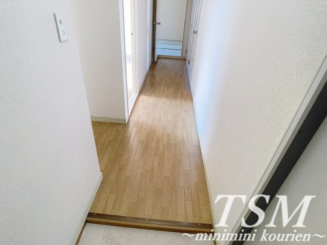 クイーンズコート　Ａ棟の玄関