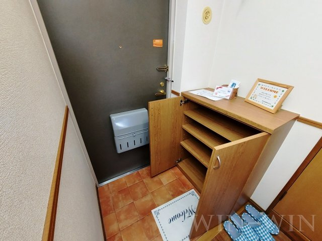 ボンヌシャンス 壱番館の玄関