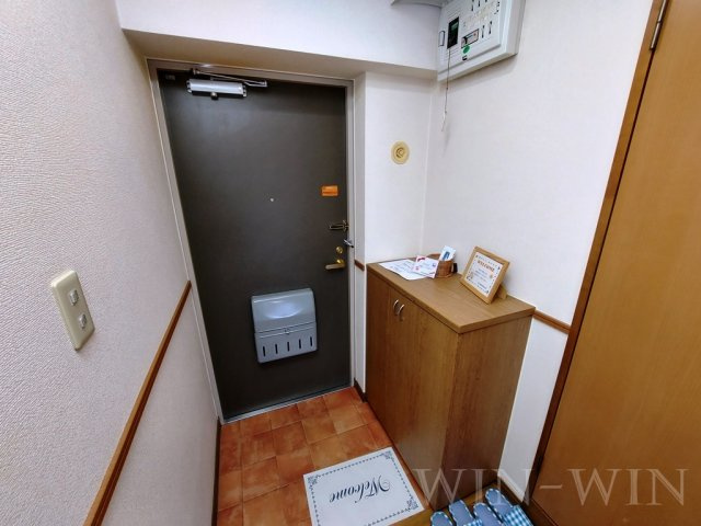 ボンヌシャンス 壱番館の玄関
