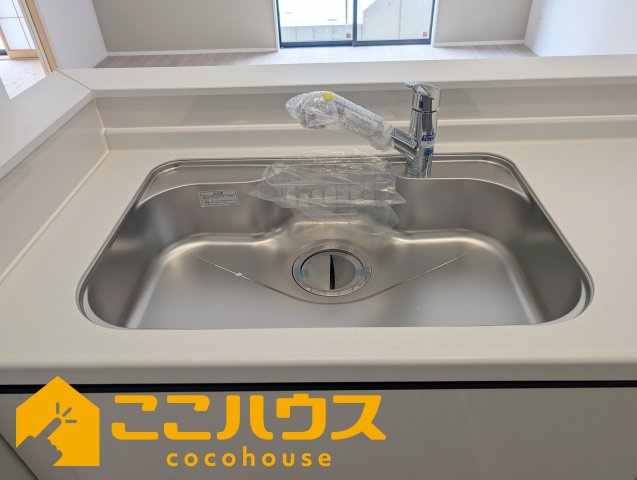 うるま市江洲2108番　新築戸建て　全10棟　G号棟のキッチン|洗い物のしやすいワイドシンク