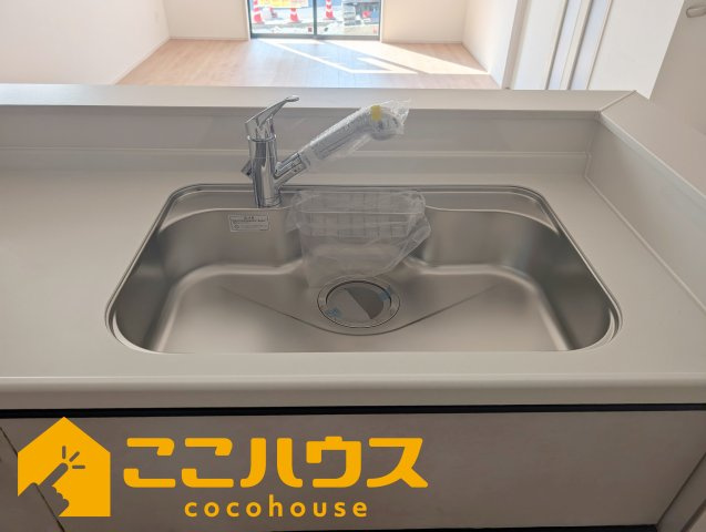 うるま市江洲2108番　新築戸建て　全10棟　H号棟のキッチン|洗い物のしやすいワイドシンク