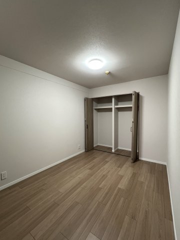 米子市錦町３丁目の中古マンションの洋室|洋室 5.5帖（リビング隣）