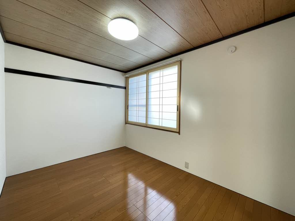 日高レジデンス Ａの洋室