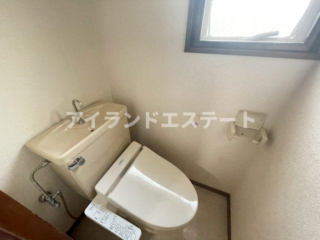 ヴィラ金谷　1フロア2住戸　L字型バルコニー　のトイレ