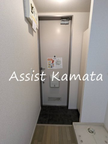 プラティーク市野倉の玄関