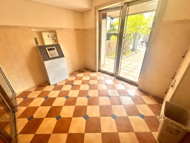ライジングコート深江本町フラワーパークのエントランス