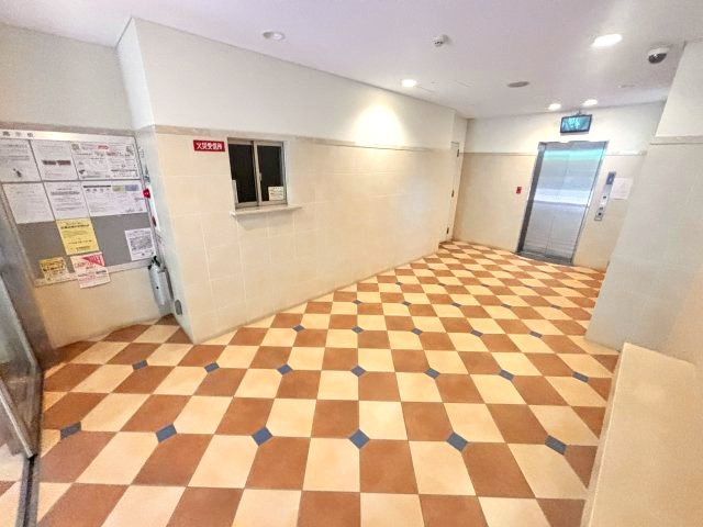 ライジングコート深江本町フラワーパークのエントランス