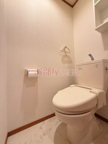 ポムダムールのトイレ|落ち着いた色調のトイレです
