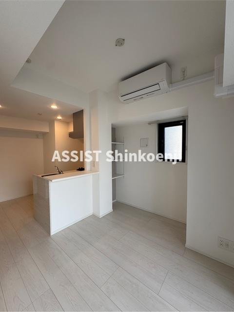 中野区中野３丁目の賃貸マンションの居間・リビング