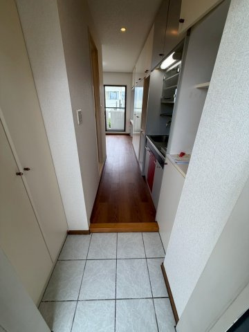 枚方市長尾谷町１丁目の賃貸マンションの玄関