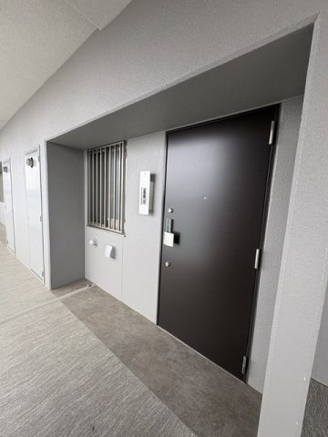 アルファスマート明石東野町人丸ヒルズ　の玄関