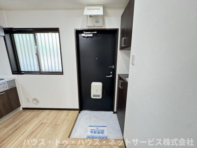 アーク春雨橋A棟の玄関