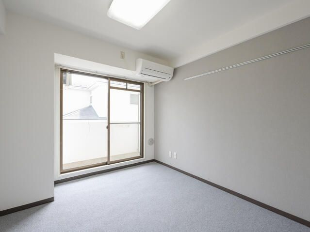日野市旭が丘２丁目の賃貸マンションの居間・リビング