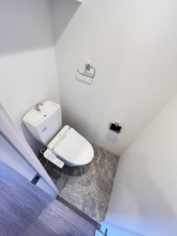 大阪市都島区中野町３丁目の賃貸マンションのトイレ