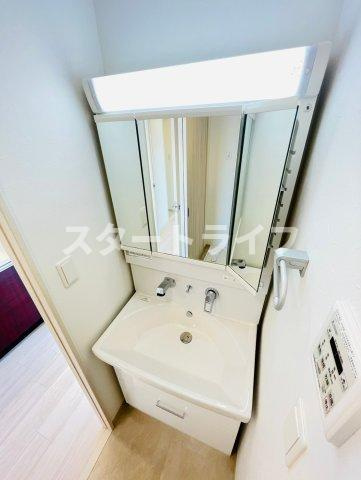 大阪市淀川区十三東４丁目の賃貸マンションの洗面所