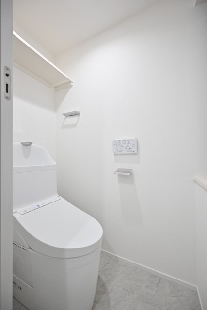 Ｔｈｅ　Ｒｅｓｉｄｅｎｃｅ　Ｎｉｈｏｎｂａｓｈｉのトイレ|落ち着いた色調のトイレです