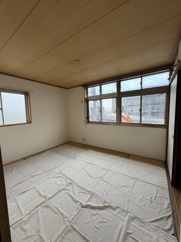 野田町田中マンションの寝室