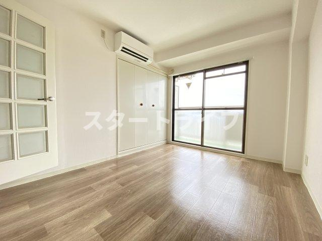 大阪市東淀川区豊新５丁目の賃貸マンションの居間・リビング