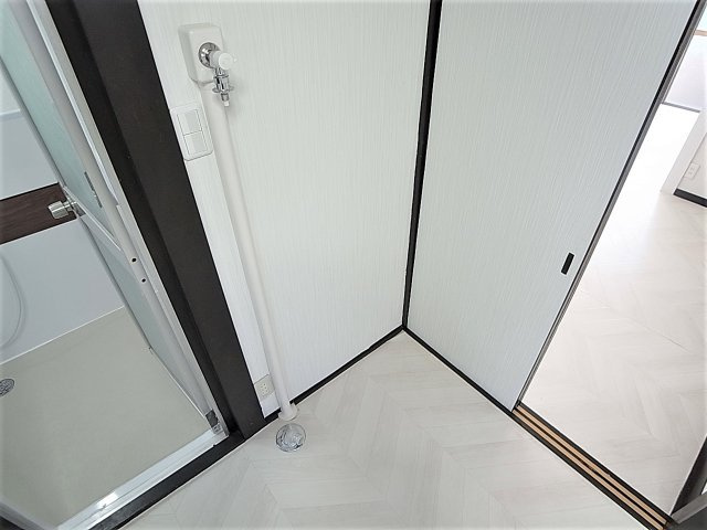 下谷上猪ころび戸建のバルコニー|室内洗濯機置き場