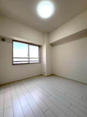 コープ野村あいの里エスパシオ三番館の洋室