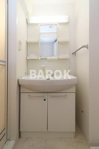 福岡市博多区空港前３丁目の賃貸マンションの洗面所