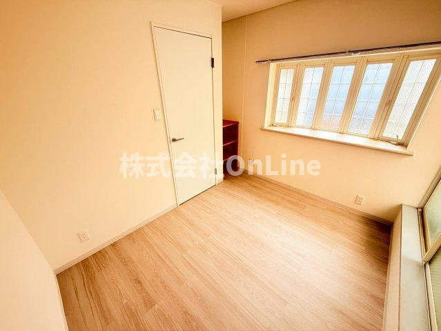 八尾市本町５丁目のアパートの寝室