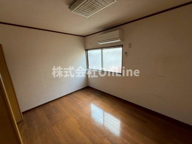 八尾市東山本町５丁目のアパートの寝室
