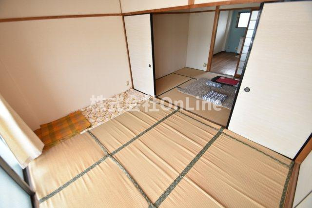 八尾市上之島町南１丁目のアパートの寝室