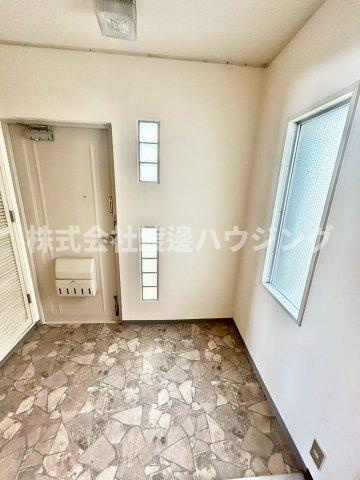 リバーサイドともぶち第1住宅の玄関