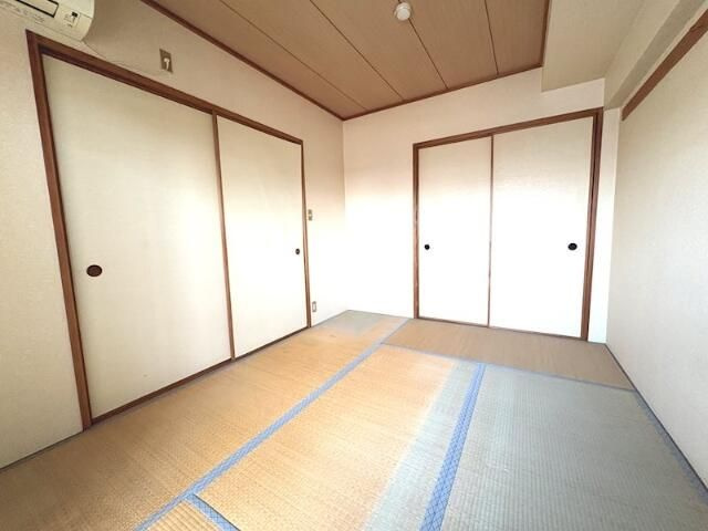 木崎台マンションの寝室|落ち着いた色調の寝室です