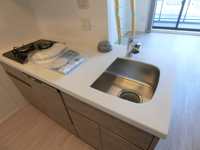ブランシエスタ新丸子リバーフロントのキッチン|間取り反転のお部屋の参考写真となります。