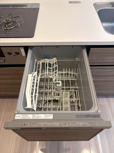 エクセレントシティ西千葉2のキッチン|暖かみのあるカラーのキッチンです。
