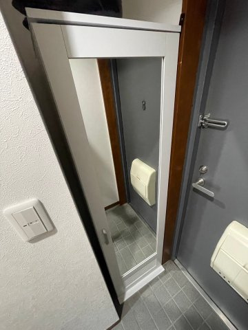 パルコート明ケ島の玄関