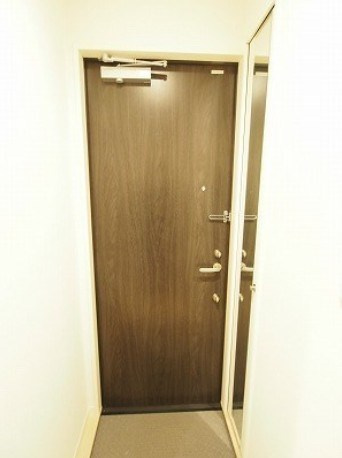 メゾン文昌府の玄関