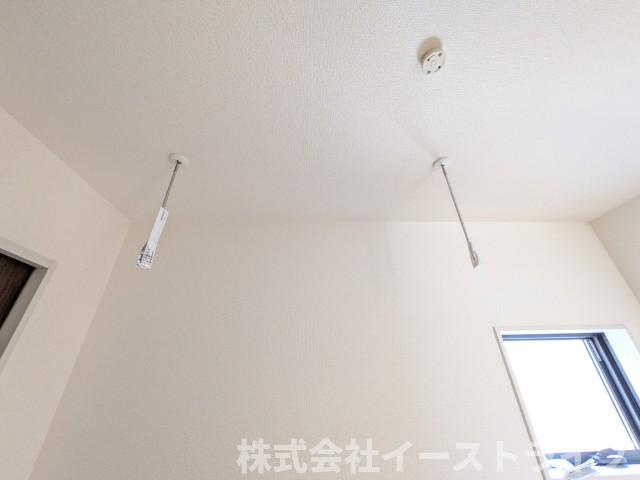 【新築戸建】　いわき市平塩第1　全2棟　長期優良住宅の内装|2号棟写真　ランドリールームには室内干しバーが設置されています