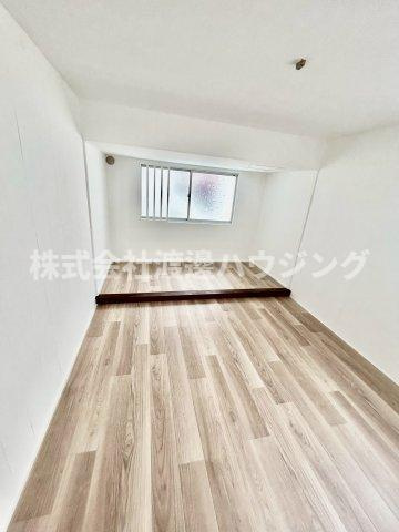 都島中通1丁目テラスハウスの洋室
