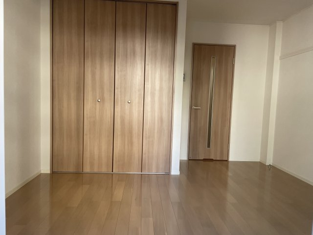 プレジオ亀沢の寝室