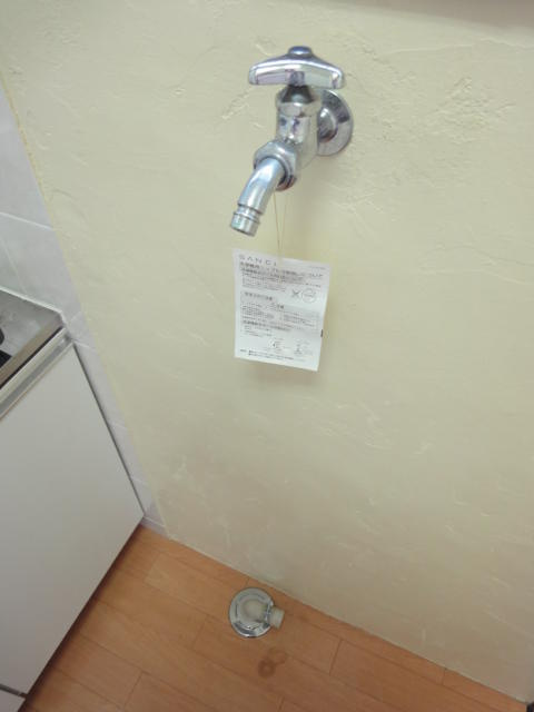 キッチン横に室内洗濯機置場