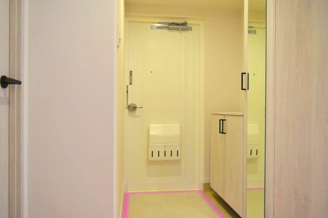 多摩市貝取３丁目の中古マンションの玄関