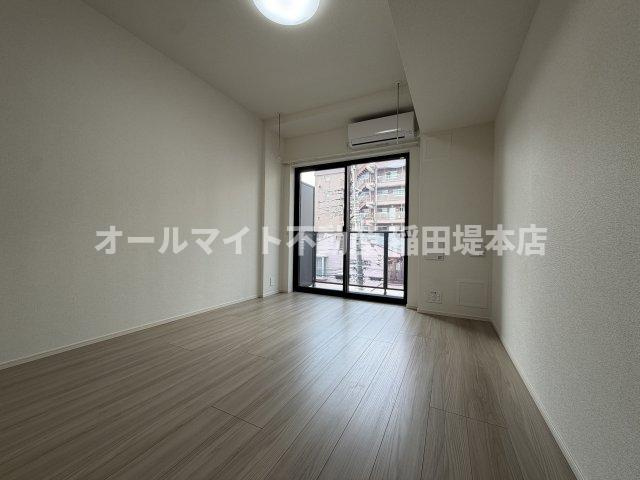 川崎市多摩区登戸新町の賃貸マンションの居間・リビング