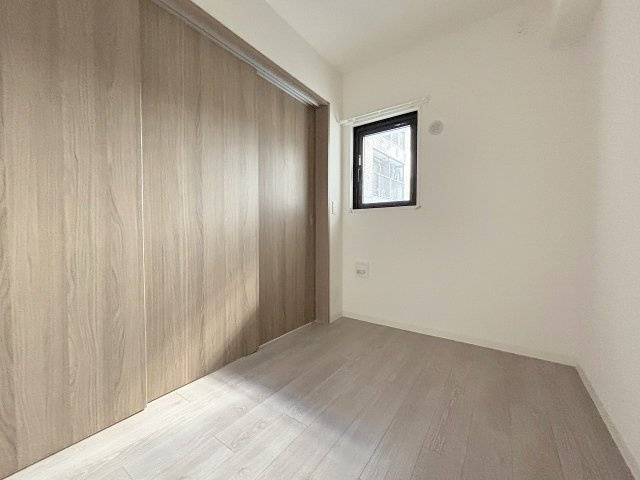 プランドール新北野の洋室